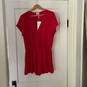 Short red romper
